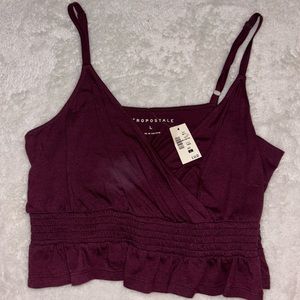 AEROPOSTALE NWT SIZE L, super cute tank with a ruffle waist band